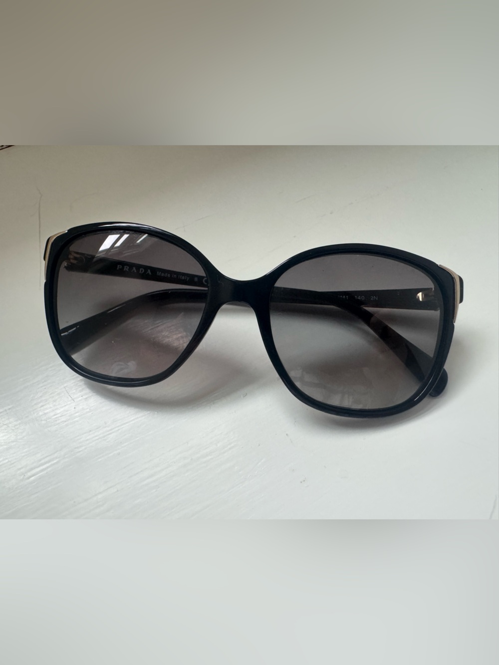 Prada Black Frame Sunglasses with Gradient Smoke Lenses